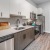 kitchen interior with ample counter space and on wood-style flooring